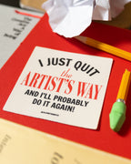 Vinyl sticker with 'I Just Quit the Artist's Way and I'll probably do it again' text in black and red, on a red background with a broken pencil next to the book 'The Creative Act: A way of being'