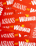 A pile of red rectangular bumper stickers featuring the text 'ASIANS FOR Wawa' in white and yellow, with a small yellow bird logo.