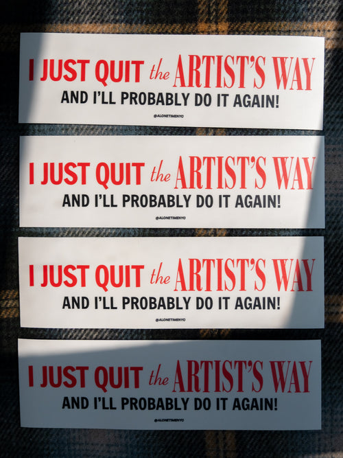 Four identical bumper stickers with text reading "I just quit The Artist's Way and I'll probably do it again" on a plaid background