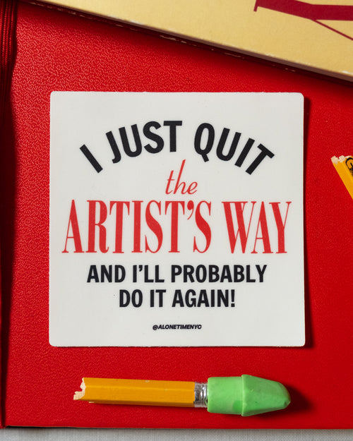 Vinyl sticker with 'I Just Quit the Artist's Way and I'll probably do it again' text in black and red, on a red background with a pencil.